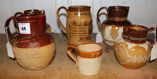 Doulton Royal commemorative jug, a Gladstone jug and three other stoneware items(-)